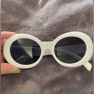 White oval sunglasses